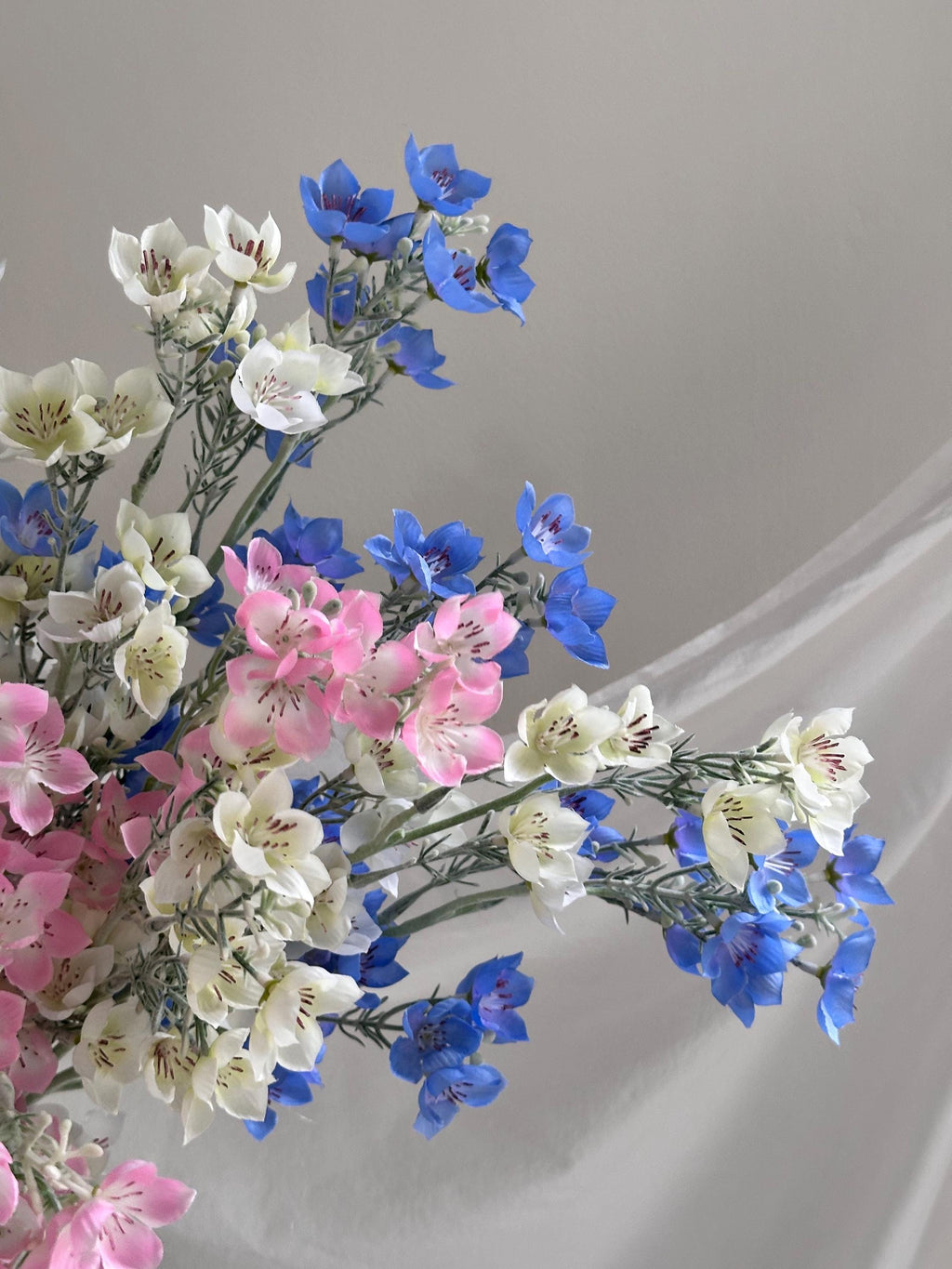 Faux forget-me-not flowers
