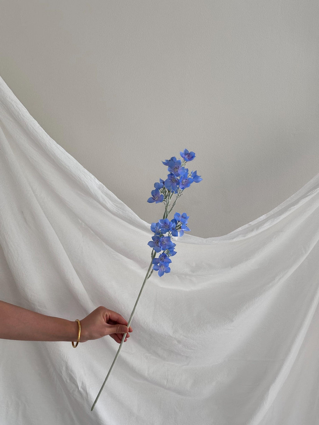 Faux forget-me-not flowers