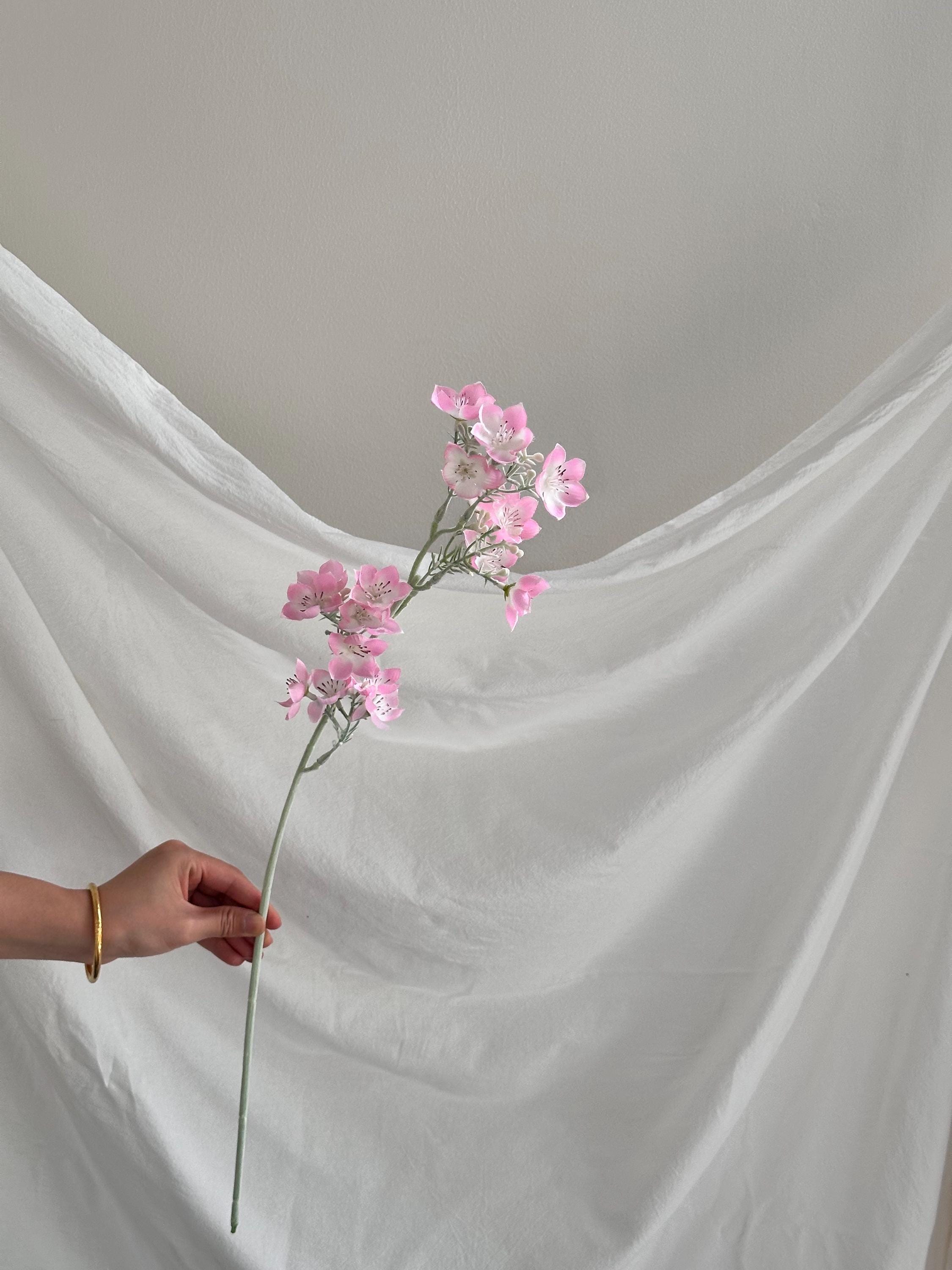 Faux forget-me-not flowers